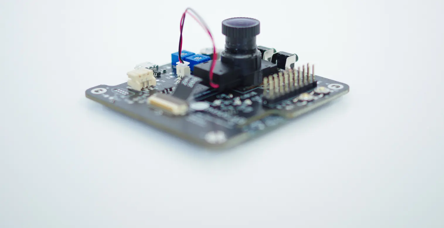 Close-up of the Tokay Lite board showing the OV2640 camera module and IR LEDs